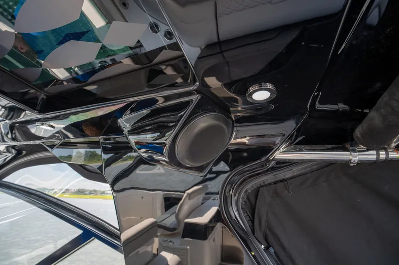 Slide: The Image of Close-up of a speaker on a 2026 Sea Ray Sundancer 370 Outboard. - 26