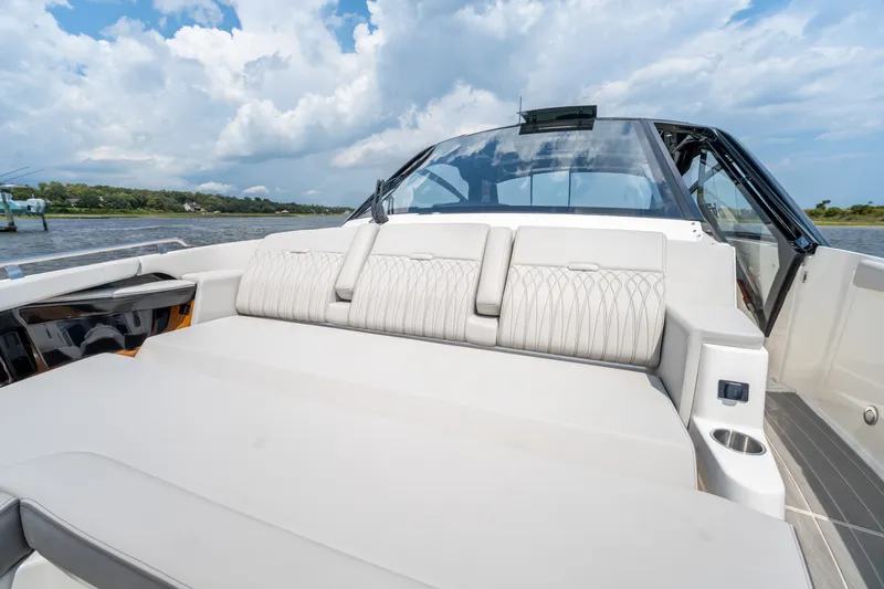 Slide: The Image of The 2026 Sea Ray Sundancer 370 Outboard features sleek, modern design with comfortable seating. - 47