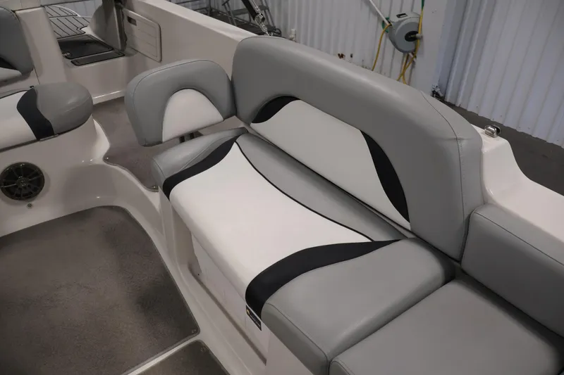 Slide: The Image of 2015 Starcraft Star Step 220 I/O boat interior with gray and white seating. - 15