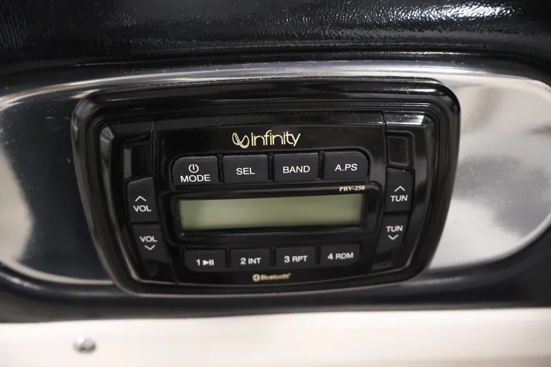 Slide: The Image of Infinity stereo system on 2015 Starcraft Star Step 220 I/O boat dashboard. - 24