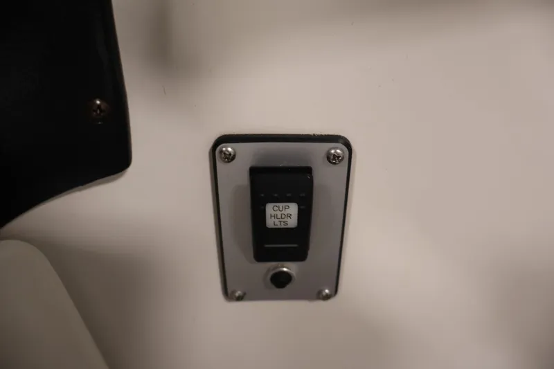 Slide: The Image of Switch for cup holder lights on 2015 Starcraft Star Step 220 I/O boat. - 26