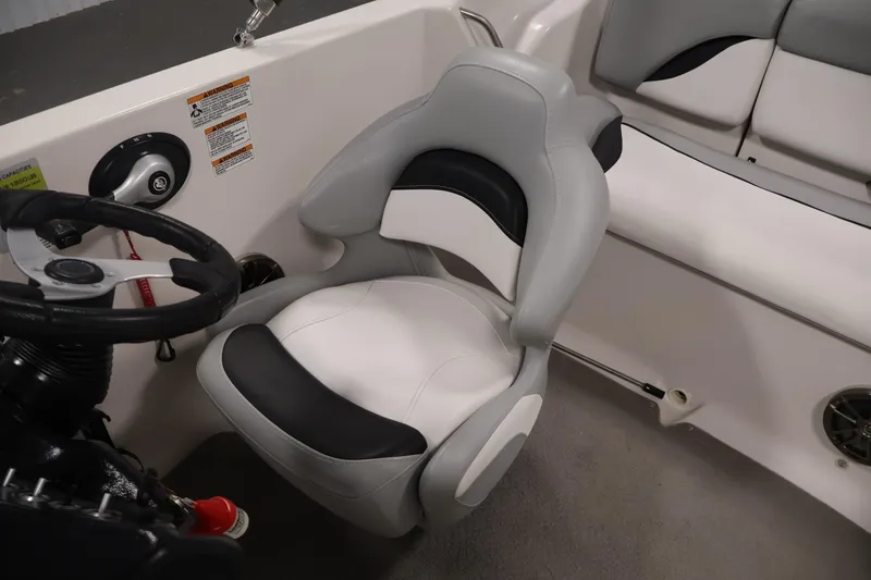 Slide: The Image of Captain's seat and steering wheel of 2015 Starcraft Star Step 220 I/O boat. - 28