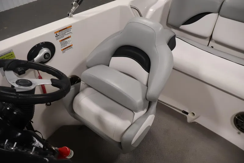 Slide: The Image of Captain's seat and steering wheel of 2015 Starcraft Star Step 220 I/O boat. - 29