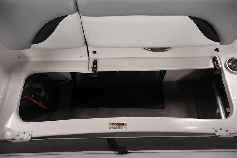 Slide: The Image of Open storage compartment in 2015 Starcraft Star Step 220 I/O boat interior. - 33