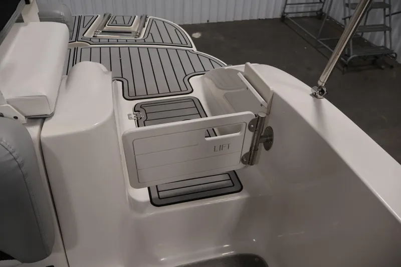 Slide: The Image of 2015 Starcraft Star Step 220 I/O boat interior with lift gate and non-slip flooring. - 36