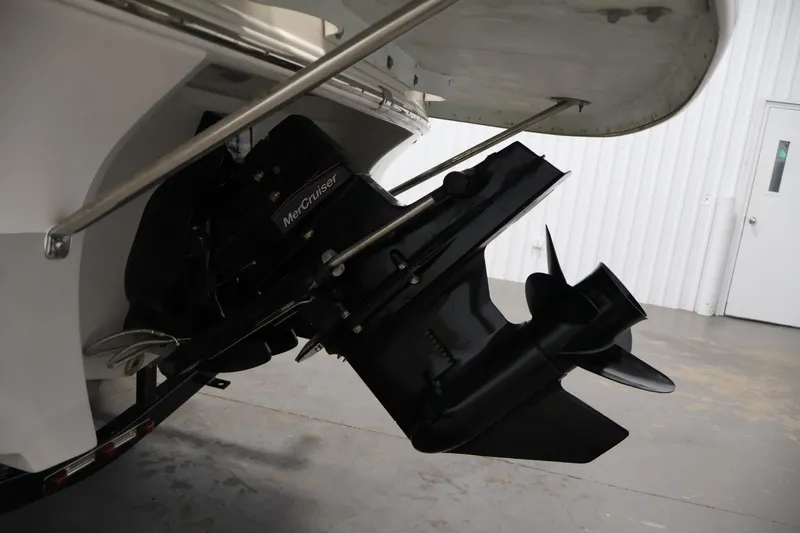 Slide: The Image of 2015 Starcraft Star Step 220 I/O boat with MerCruiser engine in a garage. - 44