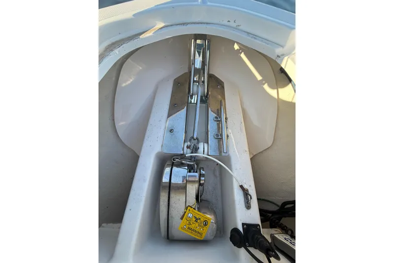 Slide: The Image of Anchor system of a 2016 Pursuit DC 265 Dual Console boat. - 30