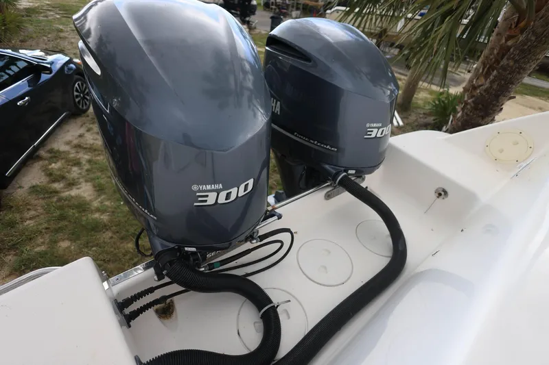 Slide: The Image of Twin Yamaha 300 engines on a 2018 Robalo R305 Walkaround boat. - 9