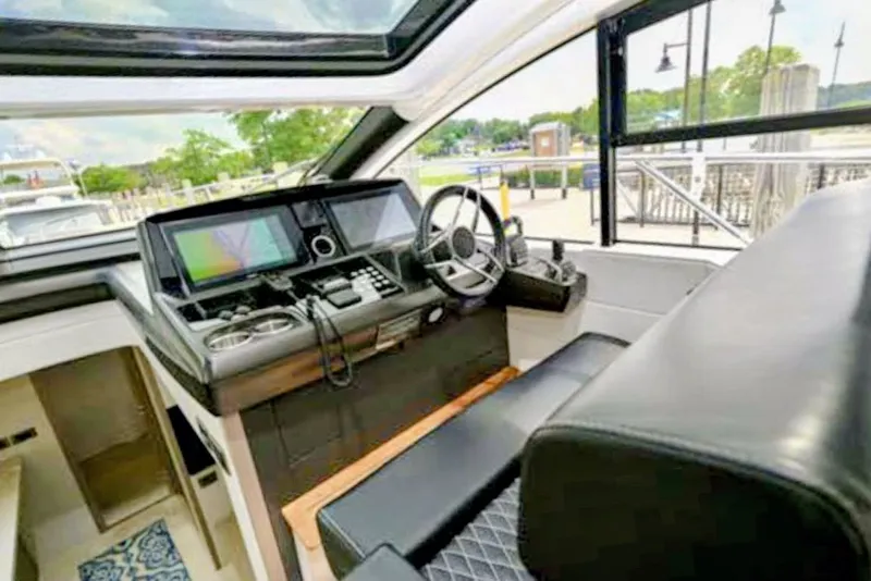 Slide: The Image of Interior view of Sunseeker Predator 50 cockpit, year 2019. - 20