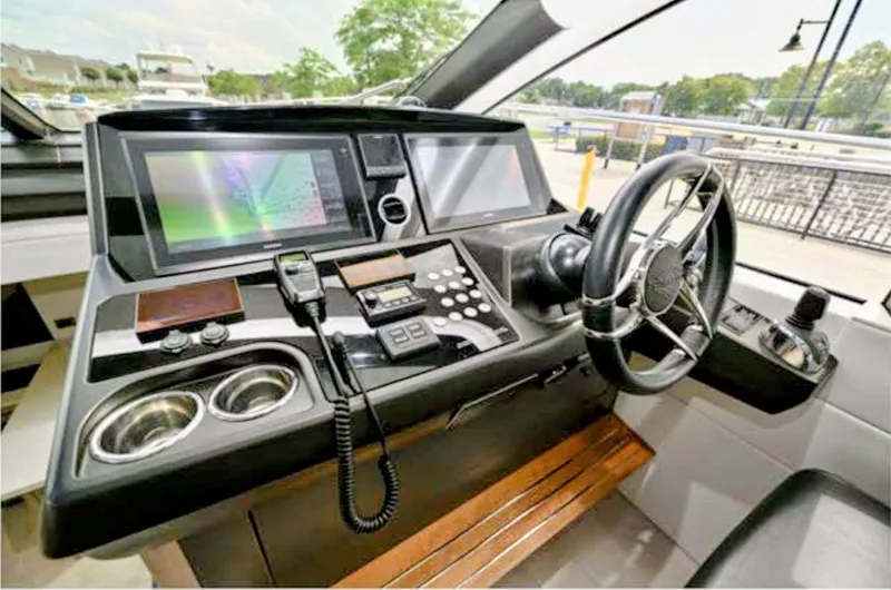 Slide: The Image of Cockpit of 2019 Sunseeker Predator 50 with modern navigation technology. - 21