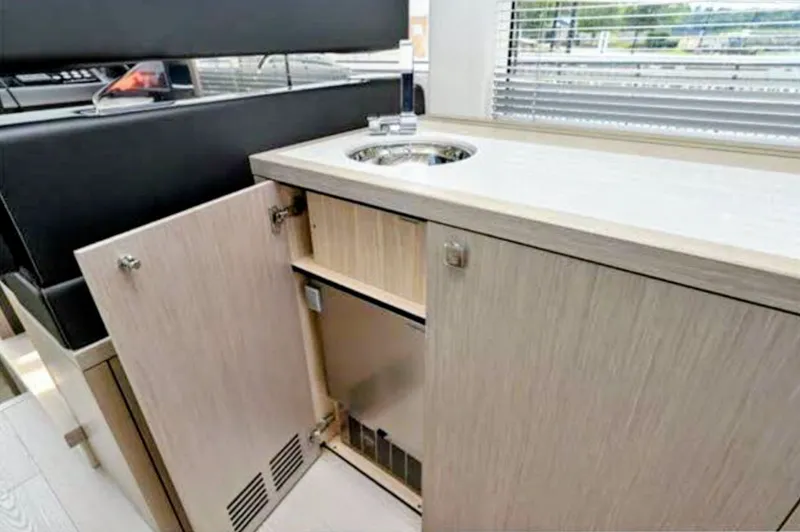 Slide: The Image of Interior of 2019 Sunseeker Predator 50 yacht with sink and cabinet. - 26