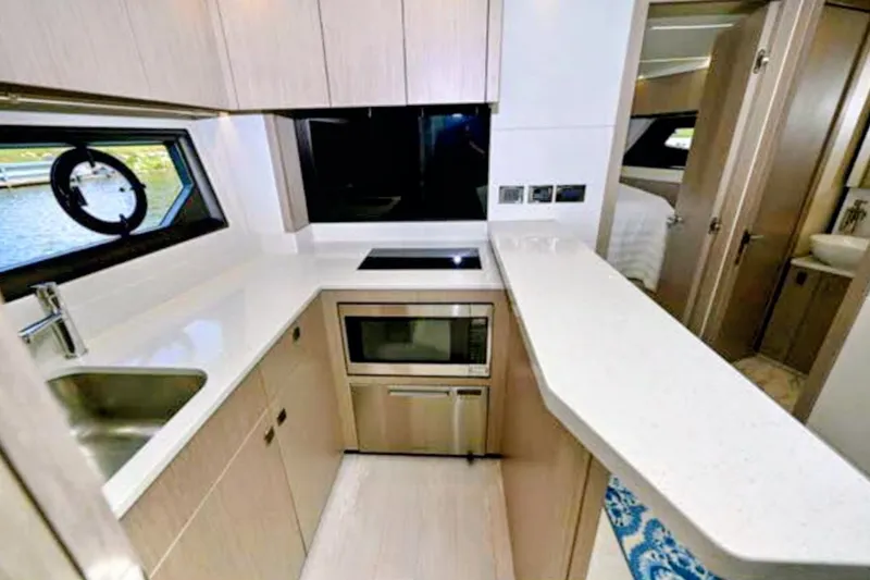 Slide: The Image of Interior of Sunseeker Predator 50 yacht kitchen, 2019 model. - 32