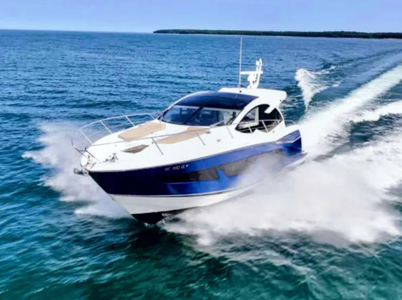 Slide: The Image of Sunseeker Predator 50 yacht cruising on open sea, 2019 model. - 4