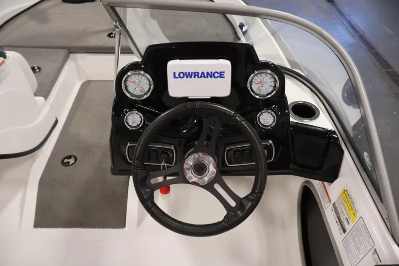 Slide: The Image of Steering console of 2019 Nitro Z19 Sport boat with Lowrance display and gauges. - 21