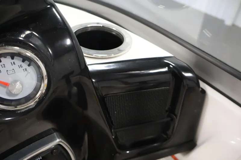 Slide: The Image of Dashboard of 2019 Nitro Z19 Sport boat with gauge and cup holder. - 29