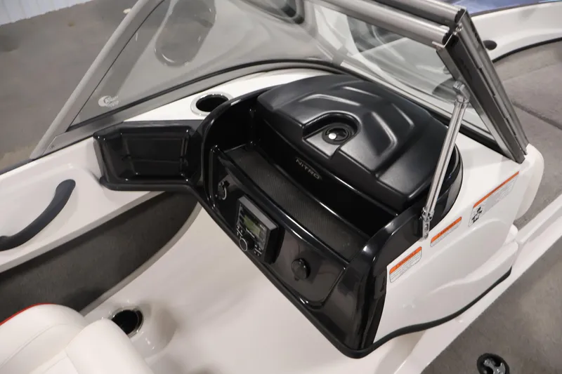 Slide: The Image of 2019 Nitro Z19 Sport boat dashboard with windshield and control panel. - 32