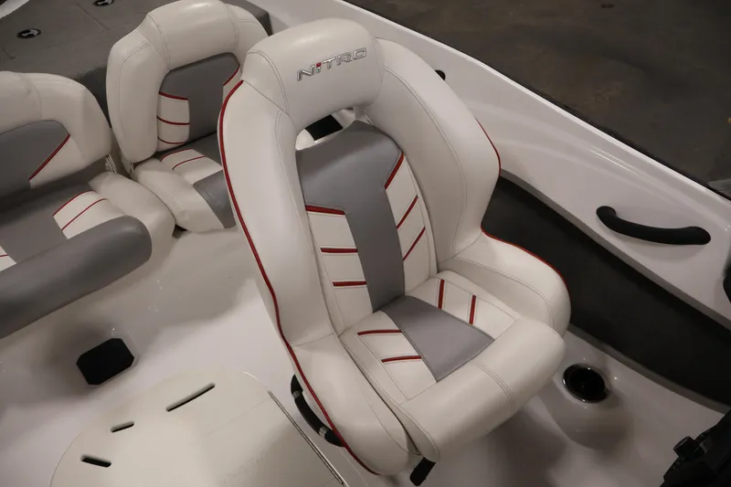 Slide: The Image of 2019 Nitro Z19 Sport boat interior with white and gray seating. - 35