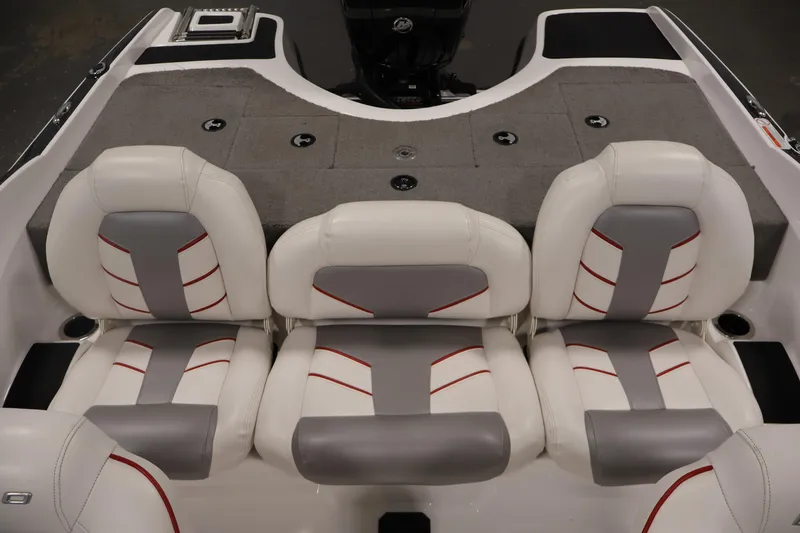 Slide: The Image of 2019 Nitro Z19 Sport boat interior with white and gray seating. - 38