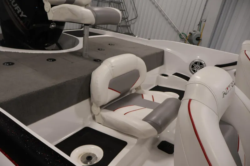 Slide: The Image of 2019 Nitro Z19 Sport boat interior with white and gray seating, featuring red accents. - 41
