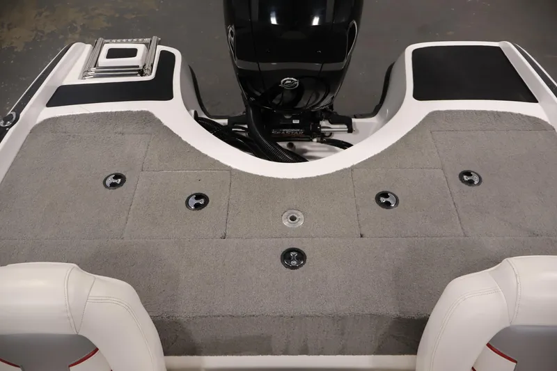 Slide: The Image of 2019 Nitro Z19 Sport boat deck with carpeted surface and motor. - 45