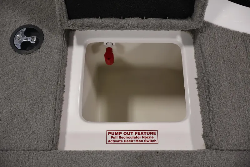 Slide: The Image of 2019 Nitro Z19 Sport boat compartment with pump-out feature and recirculator nozzle. - 47
