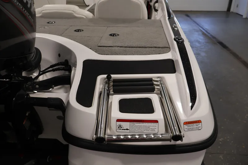 Slide: The Image of 2019 Nitro Z19 Sport boat with motor and foldable ladder on deck. - 51
