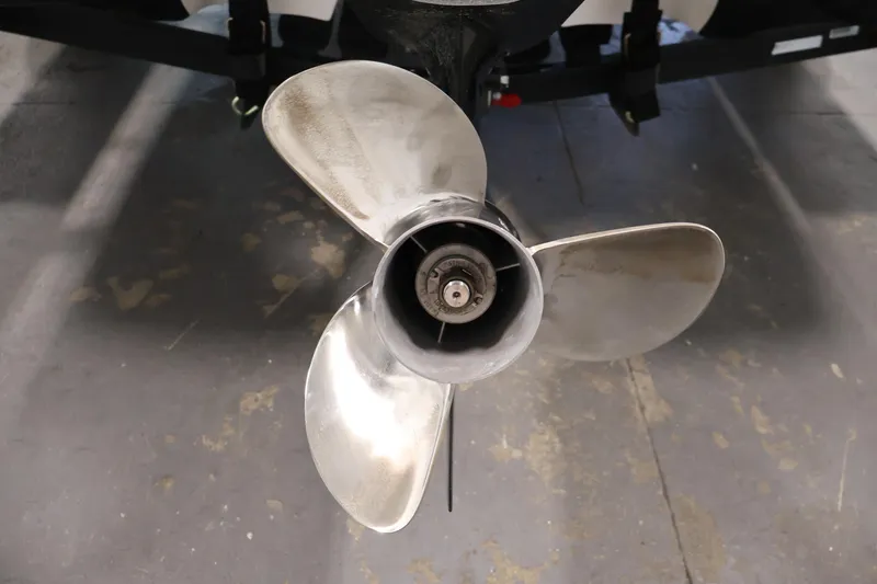 Slide: The Image of Propeller of a 2019 Nitro Z19 Sport boat on a concrete floor. - 56