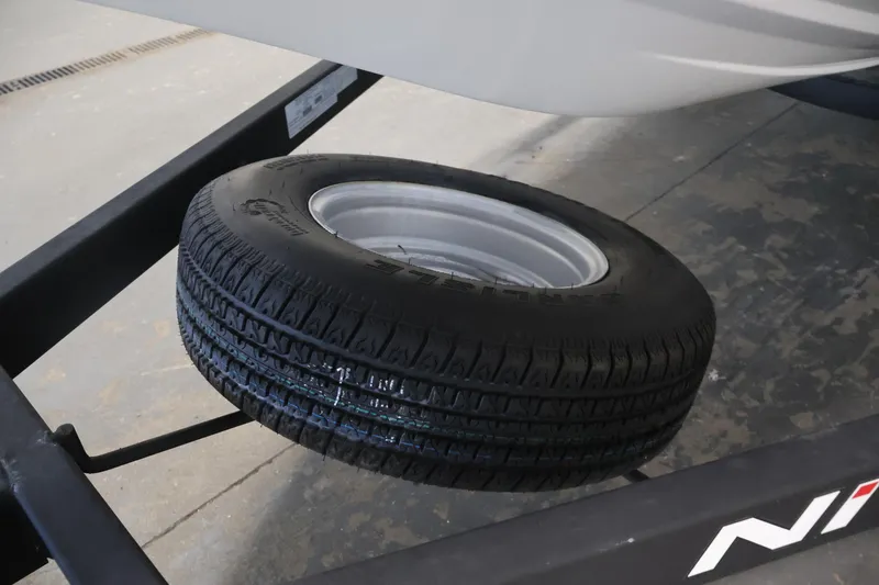 Slide: The Image of Spare tire mounted on a 2019 Nitro Z19 Sport trailer. - 58