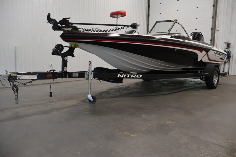 Slide: The Image of 2019 Nitro Z19 Sport boat on trailer in indoor storage facility. - 59