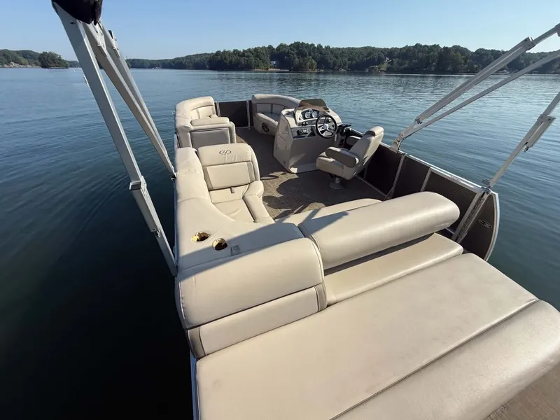 Slide: The Image of Harris Cruiser 230 pontoon boat on calm water, year 2021. - 3