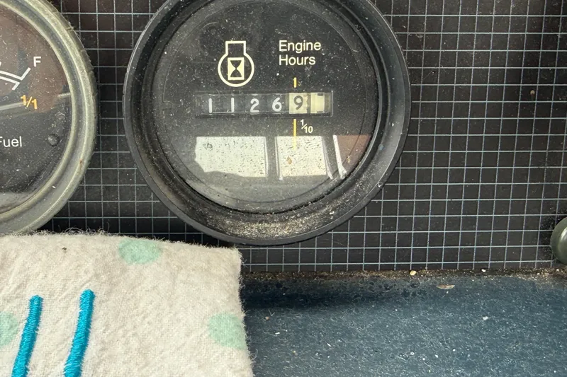 Slide: The Image of Engine hour meter showing 1126.9 hours on a 1986 Sea Ray 410 Aft Cabin. - 25