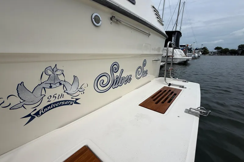 Slide: The Image of 1986 Sea Ray 410 Aft Cabin boat, "Silver Sea," 25th anniversary celebration. - 31