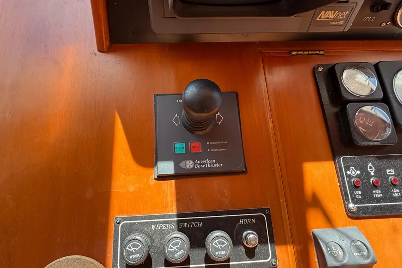 Slide: The Image of Control panel of a 2001 Kadey-Krogen 39 boat with American Bow Thruster joystick. - 21