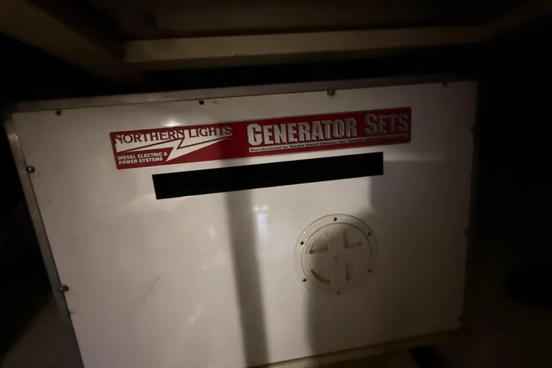 Slide: The Image of Northern Lights generator set on a 2001 Kadey-Krogen 39 boat. - 38