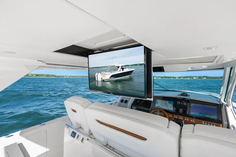 Slide: The Image of Interior view of 2024 Tiara Yachts 43 LS with advanced navigation displays. - 23