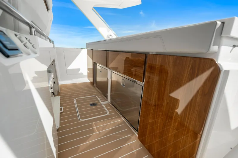 Slide: The Image of 2024 Tiara Yachts 43 LS interior with sleek cabinetry and modern design. - 25