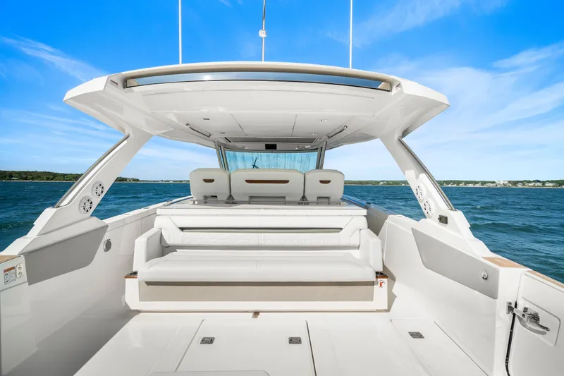 Slide: The Image of 2024 Tiara Yachts 43 LS luxury yacht interior with spacious seating and ocean view. - 29