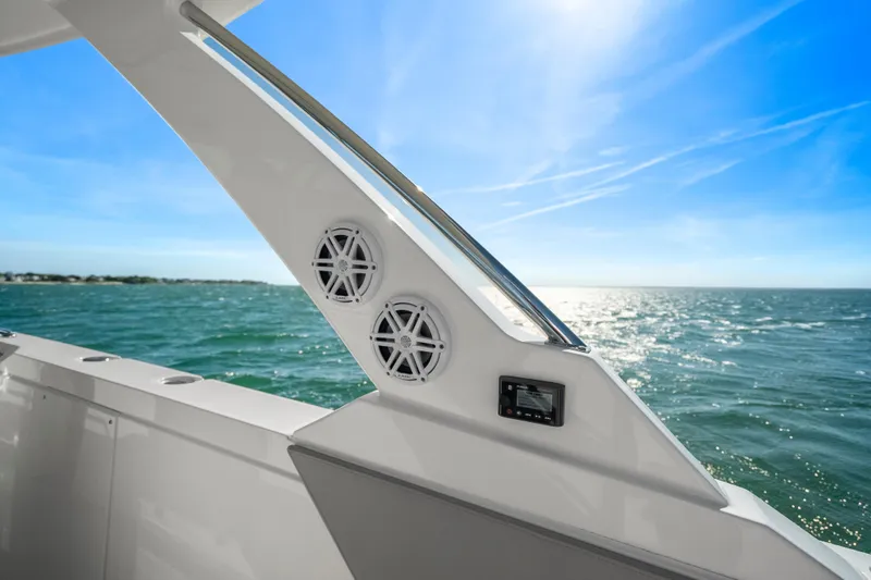Slide: The Image of 2024 Tiara Yachts 43 LS boat detail with ocean view and clear blue sky. - 33