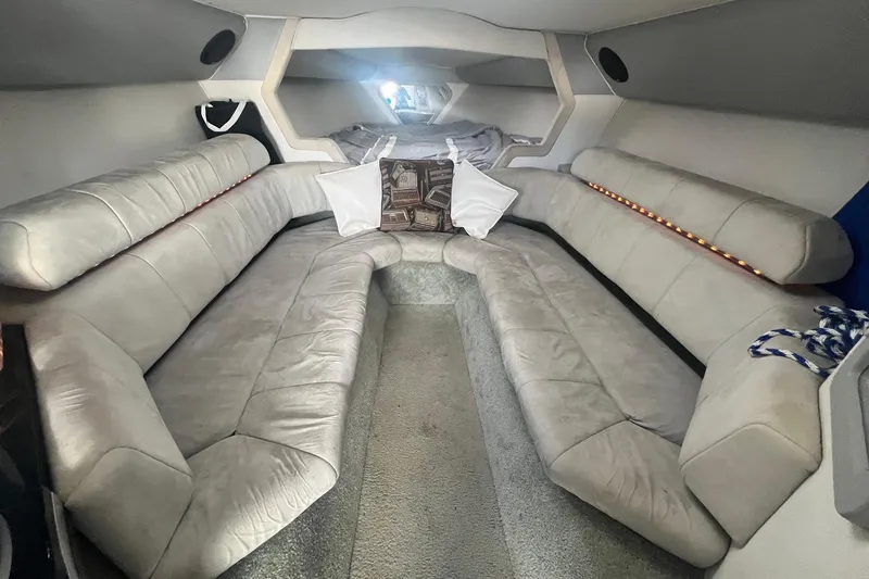 Slide: The Image of Interior of a 1994 Fountain 42 Lightning boat with plush seating and modern design. - 22