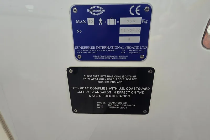 Slide: The Image of Plaques on a 2004 Sunseeker Camargue 50, displaying safety and certification details. - 18