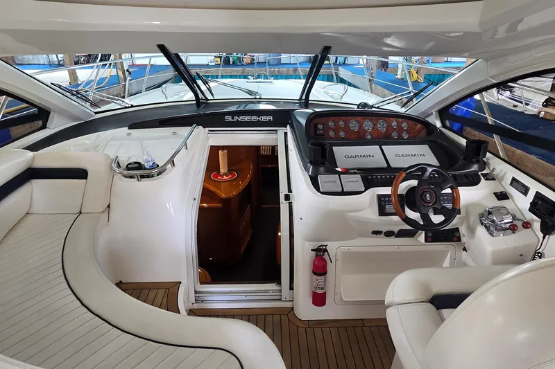 Slide: The Image of Interior of 2004 Sunseeker Camargue 50 yacht with modern helm and seating area. - 20