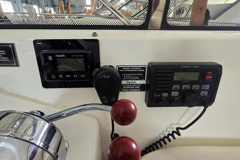 Slide: The Image of Control panel of a 2004 Sunseeker Camargue 50 yacht with radio and audio systems. - 25
