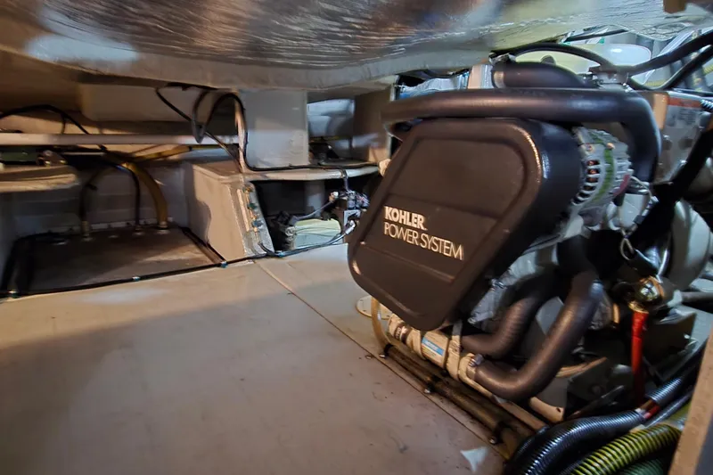 Slide: The Image of Engine room of 2004 Sunseeker Camargue 50 with Kohler power system. - 47