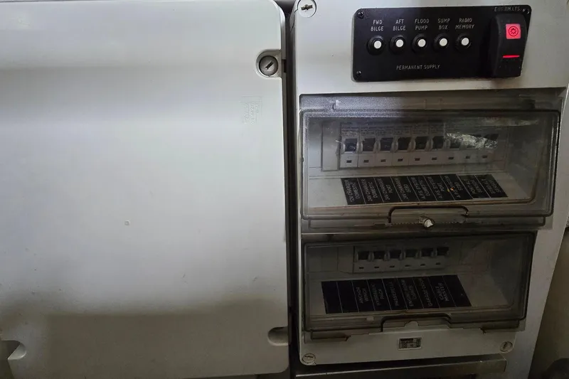 Slide: The Image of Electrical control panel on a 2004 Sunseeker Camargue 50 yacht. - 54