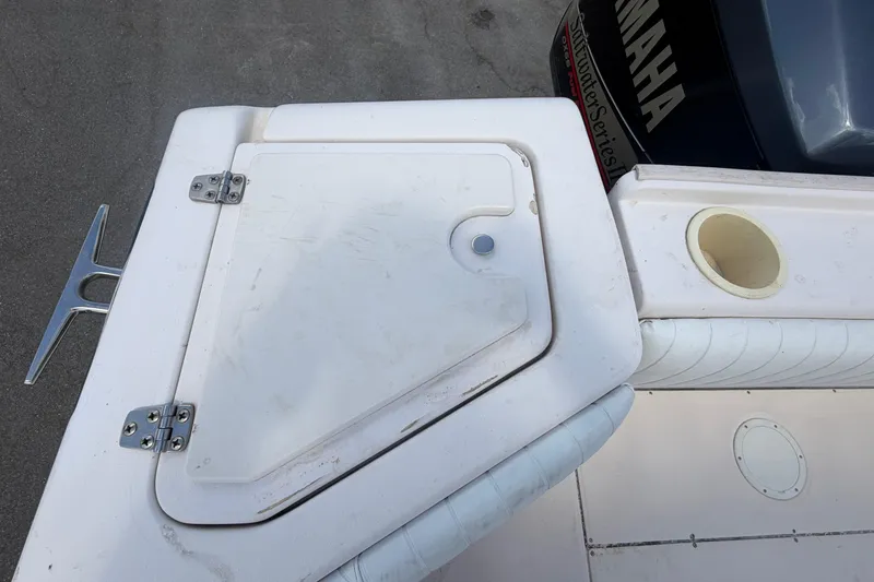 Slide: The Image of 2000 Grady-White Express 265 boat deck with Yamaha engine detail. - 104