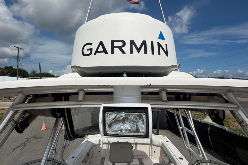 Slide: The Image of 2000 Grady-White Express 265 boat with Garmin radar, under a clear blue sky. - 27