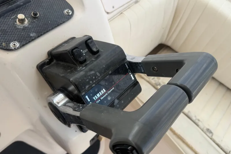 Slide: The Image of Close-up of Yamaha 704 remote control on 2000 Grady-White Express 265 boat. - 49