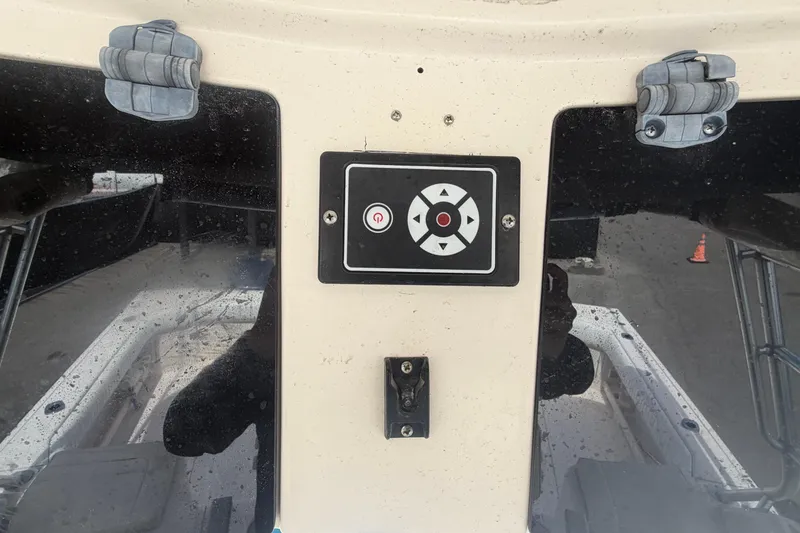 Slide: The Image of Control panel on a 2000 Grady-White Express 265 boat dashboard. - 54