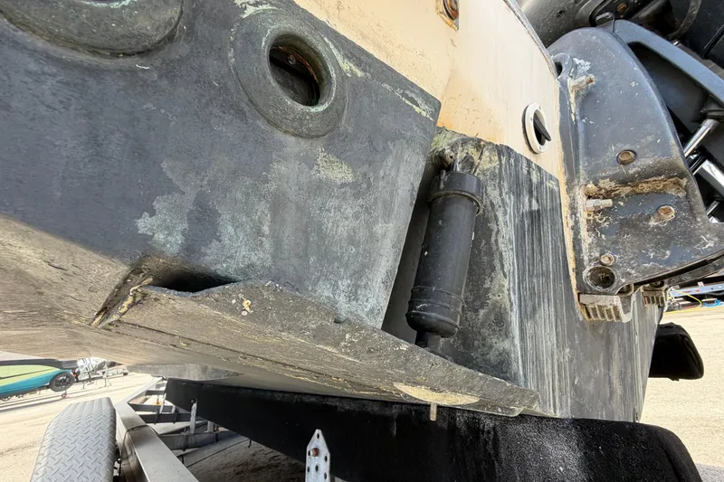 Slide: The Image of Underside view of a 2000 Grady-White Express 265 boat on a trailer. - 8