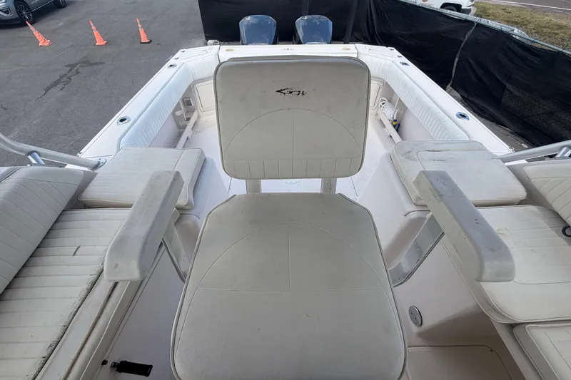 Slide: The Image of 2000 Grady-White Express 265 boat interior with seating and armrests. - 95